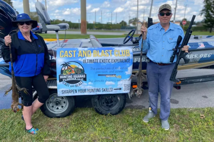 a man standing in front of a truck