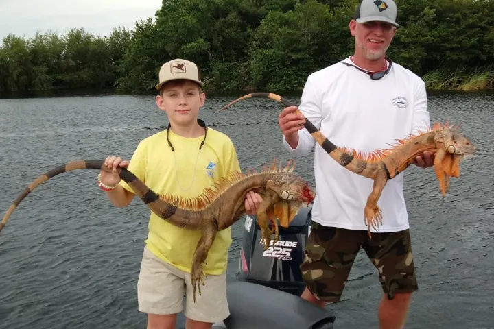 a man holding a fish