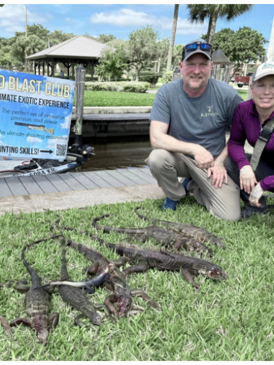 a man that is standing in the grass